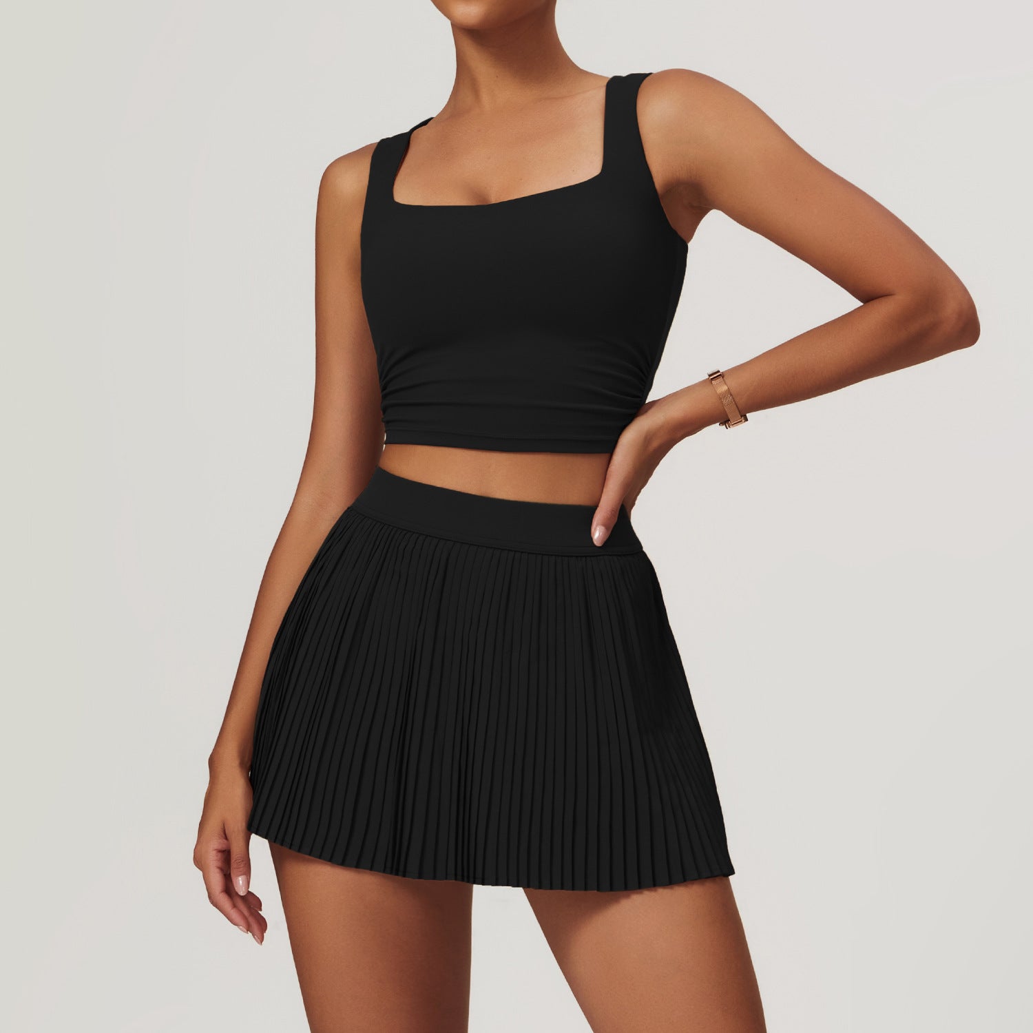Women's Breathable Activewear Sports Set with Crop Top and Pleated Performance Skirt