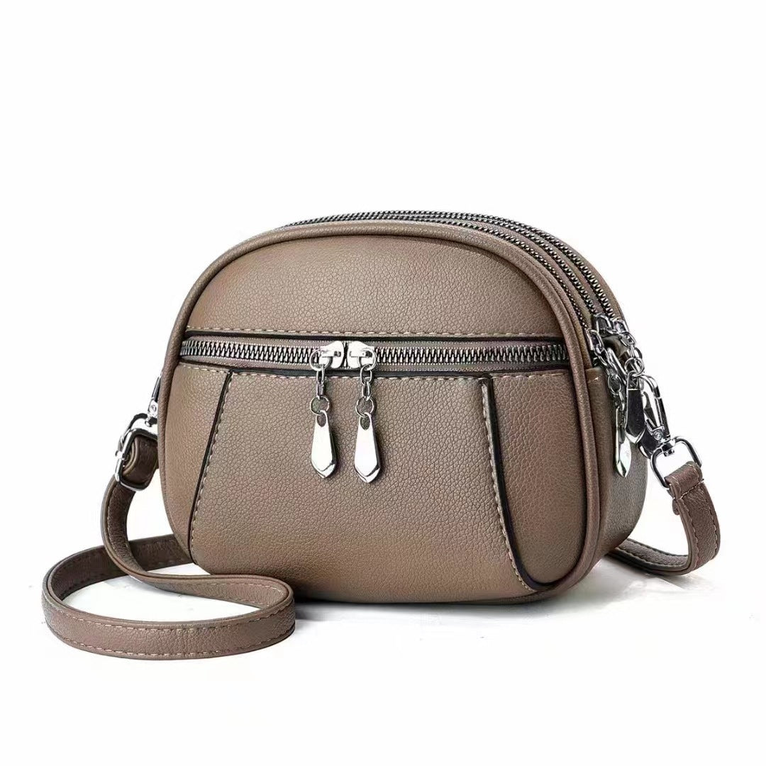 Stylish Solid Color Round Crossbody Bag for Women - Multi-Pocket Design