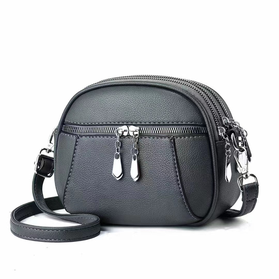 Stylish Solid Color Round Crossbody Bag for Women - Multi-Pocket Design