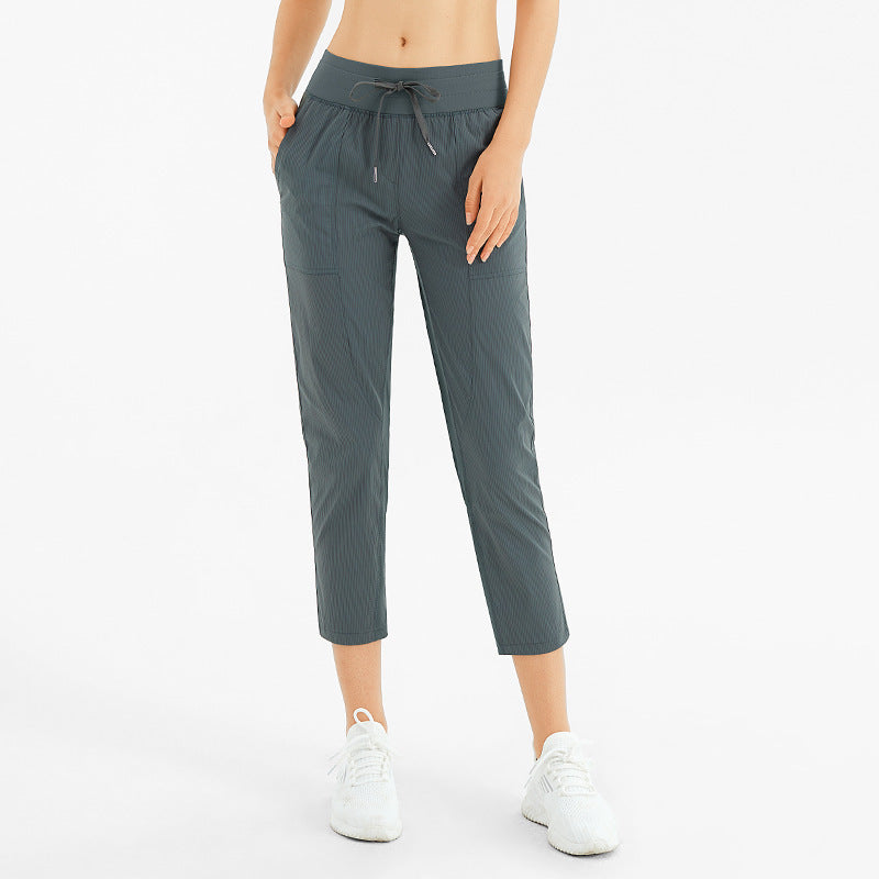 Comfortable Breathable Nine-Point Activewear Pants with Pockets for Yoga and Running