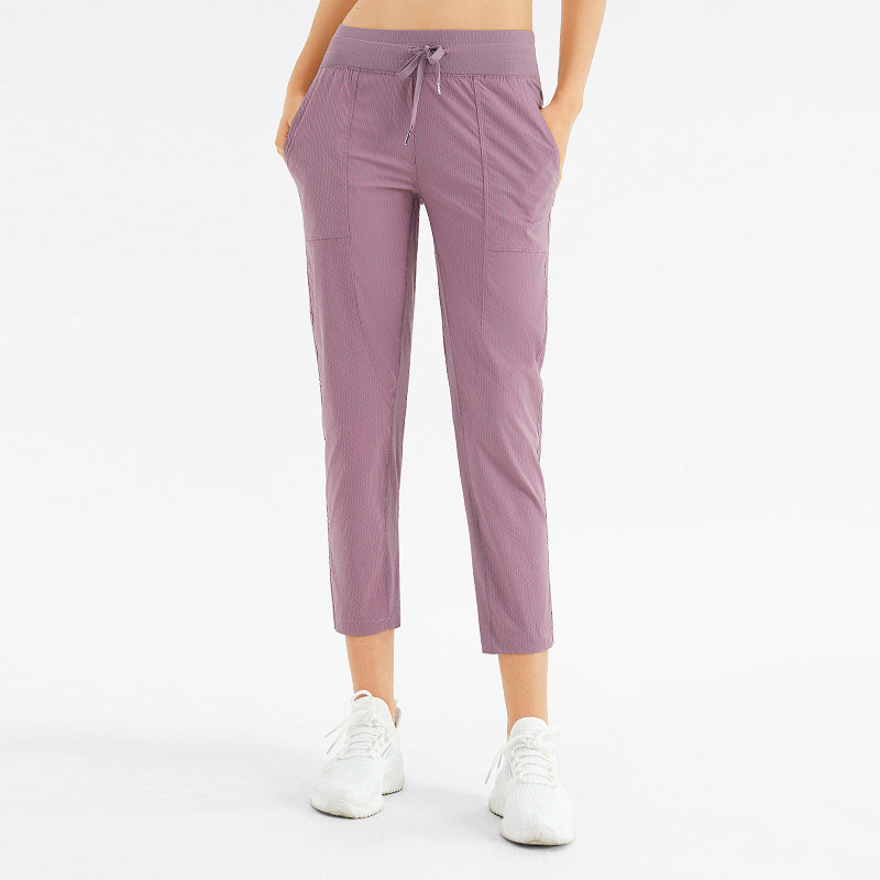 Comfortable Breathable Nine-Point Activewear Pants with Pockets for Yoga and Running