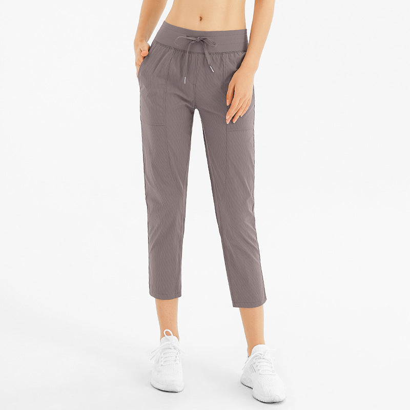 Comfortable Breathable Nine-Point Activewear Pants with Pockets for Yoga and Running
