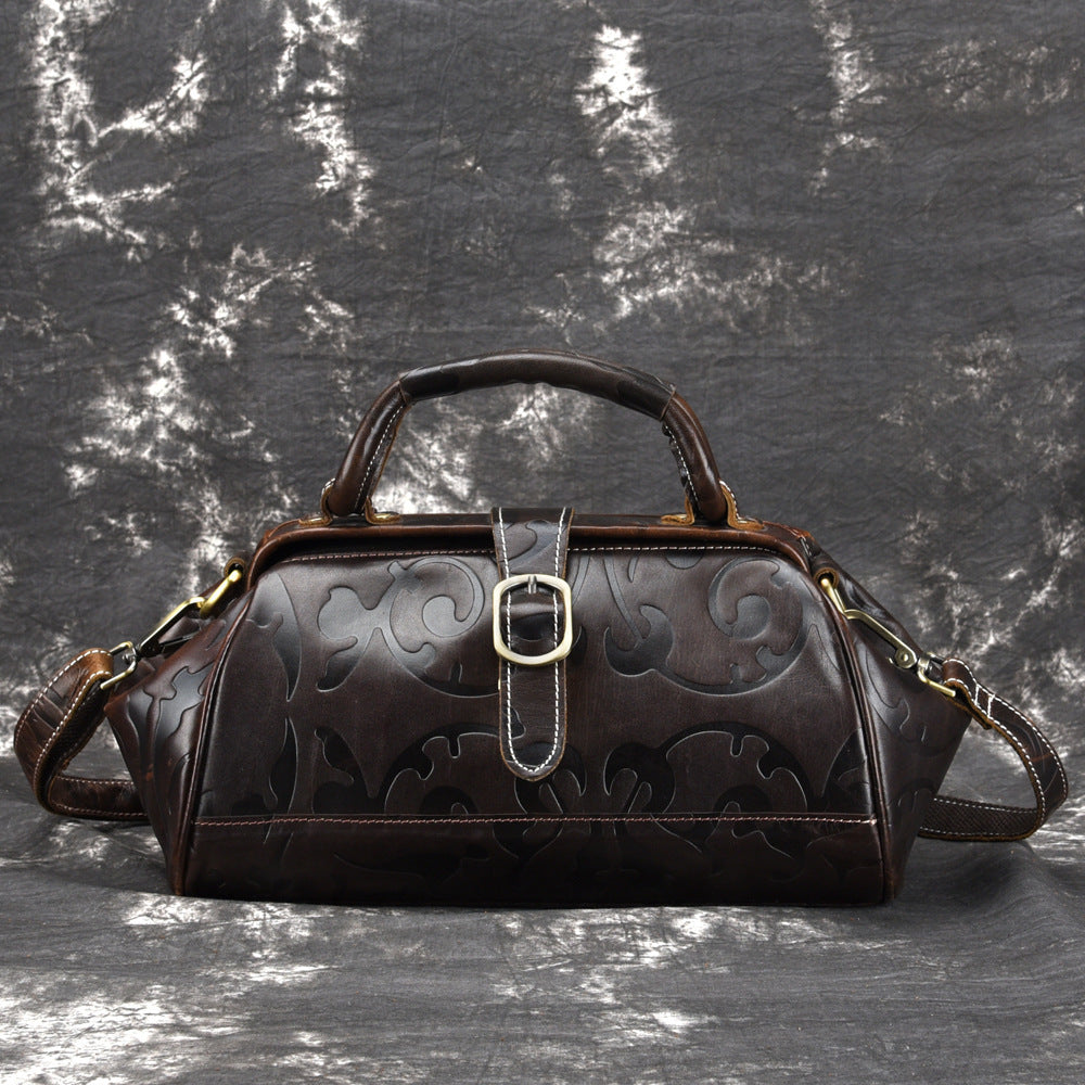 Elegant Retro Embossed Leather Satchel Bag with Secure Buckle and Adjustable Strap