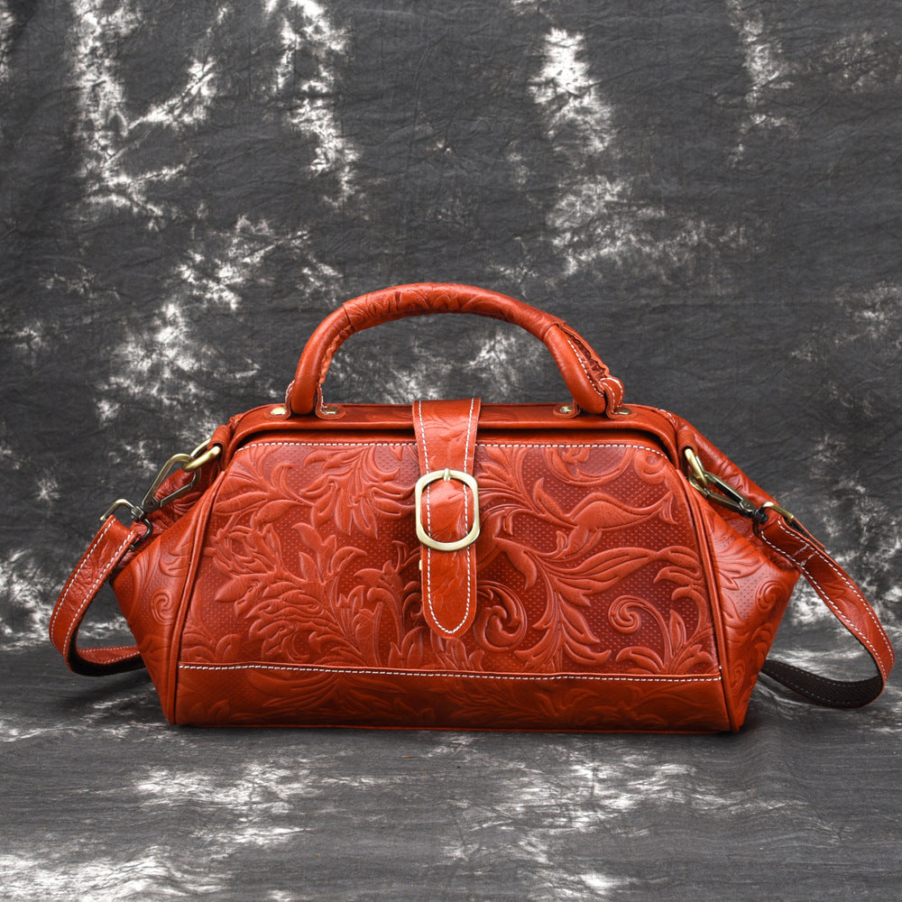 Elegant Retro Embossed Leather Satchel Bag with Secure Buckle and Adjustable Strap