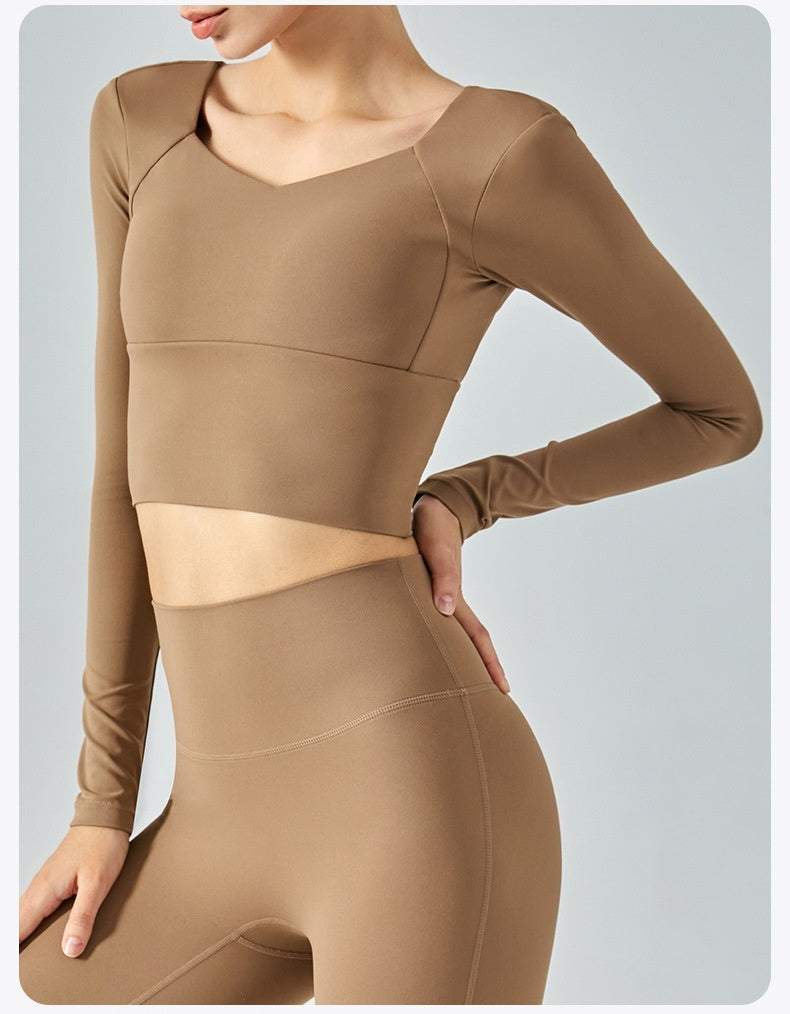 Comfortable Women's Long Sleeve Activewear Crop Top with Built-in Chest Pad for Workout and Yoga