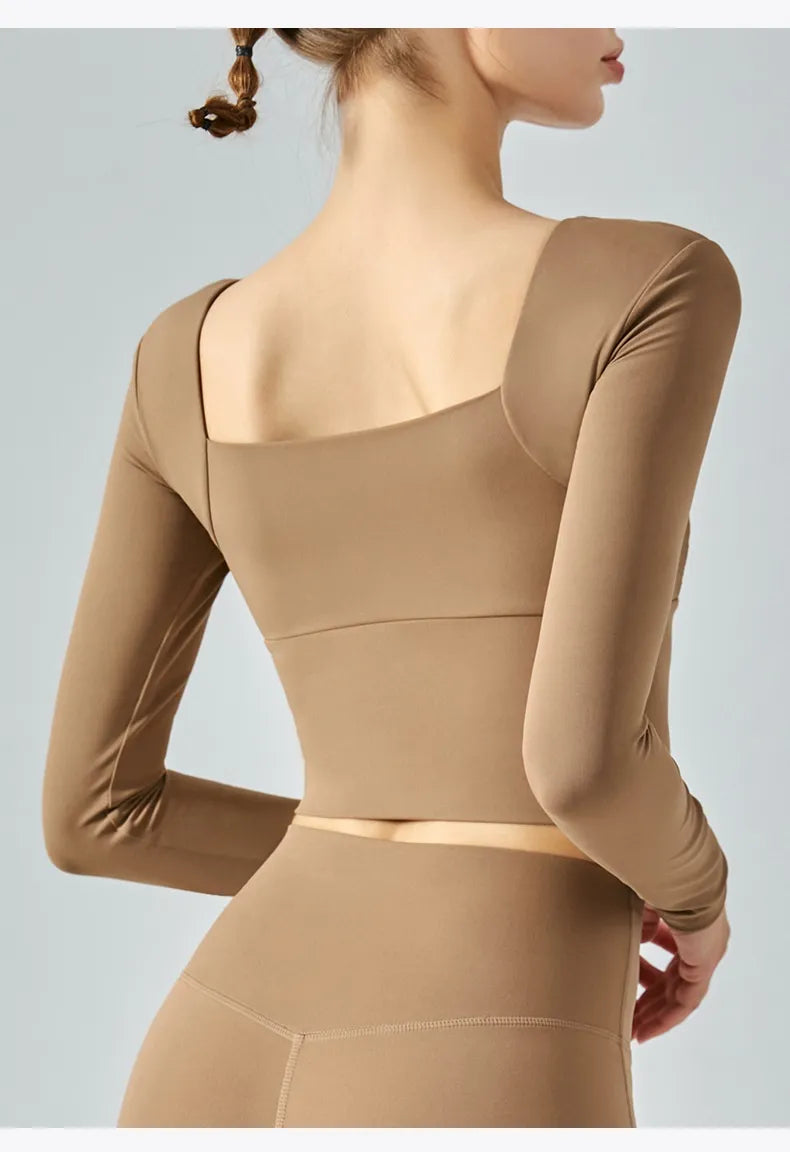 Comfortable Women's Long Sleeve Activewear Crop Top with Built-in Chest Pad for Workout and Yoga