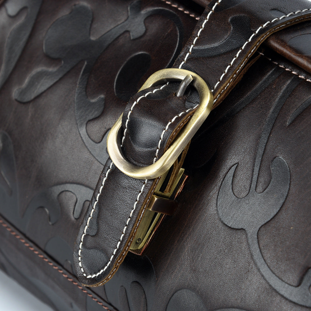 Elegant Retro Embossed Leather Satchel Bag with Secure Buckle and Adjustable Strap