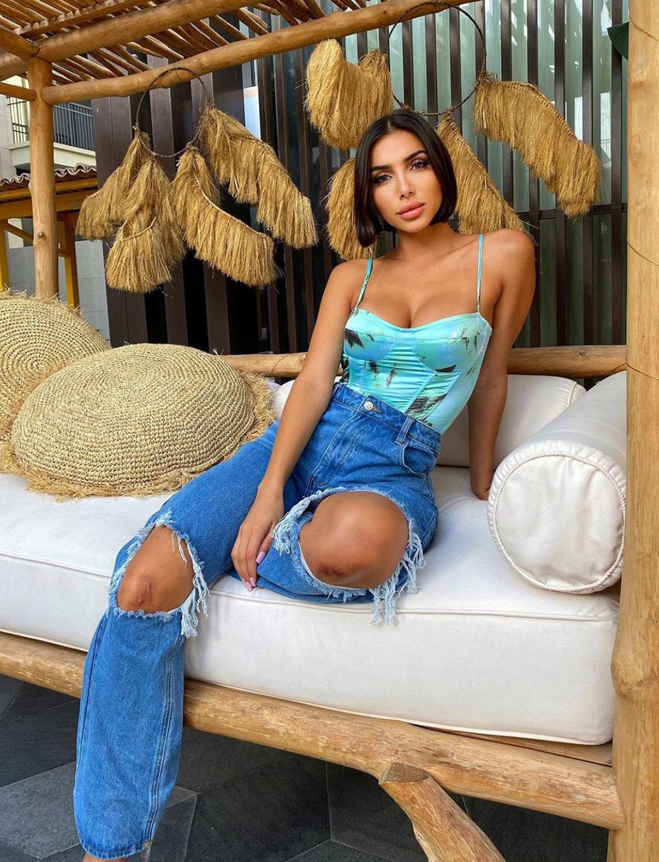 High-Waisted Ripped Wide-Leg Jeans | Ariana Vogue