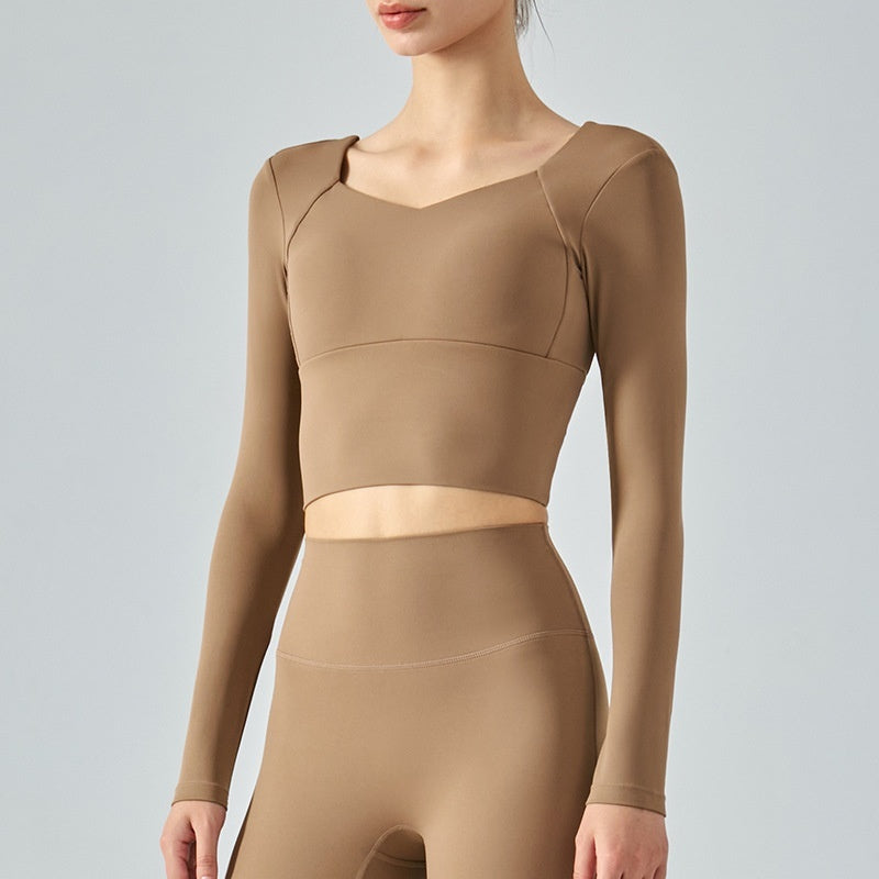 Comfortable Women's Long Sleeve Activewear Crop Top with Built-in Chest Pad for Workout and Yoga