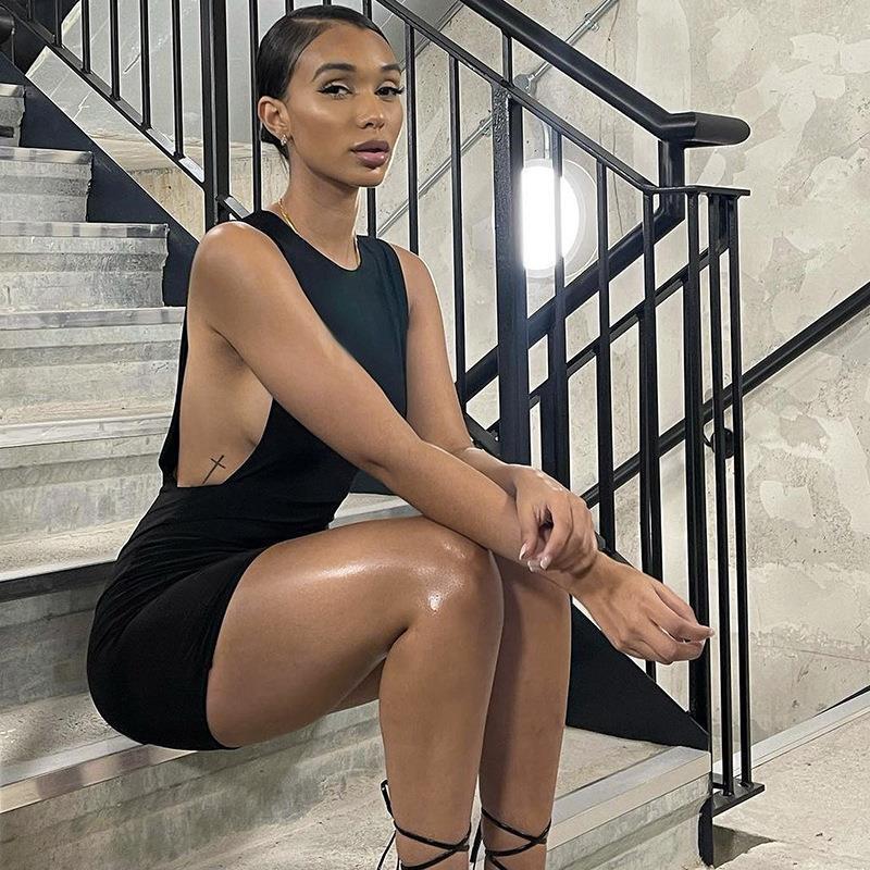 Sleek Black Bodycon Mini Dress with Daring Side Cutouts and High Neckline