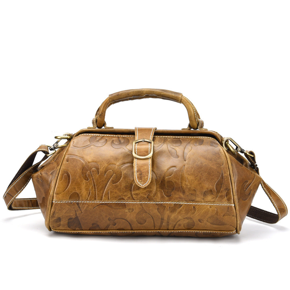 Elegant Retro Embossed Leather Satchel Bag with Secure Buckle and Adjustable Strap