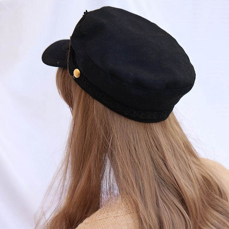Chic Black Beret with Wing & Chain Accent