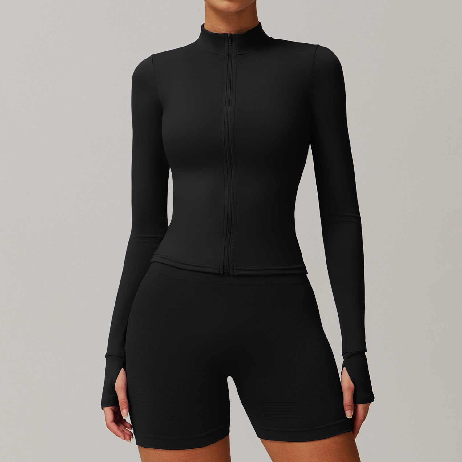 Sleek Athletic Long Sleeve Zip Up Performance Top for Running and Workouts