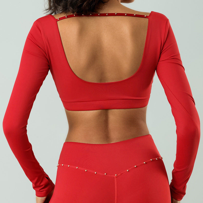 Athletic Long Sleeve Crop Top with Built In Chest Pad and Stylish Studded Cutout Design