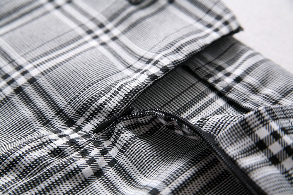 Trendy Plaid Hip Hugging Mini Skirt with Stylish Chain Detail