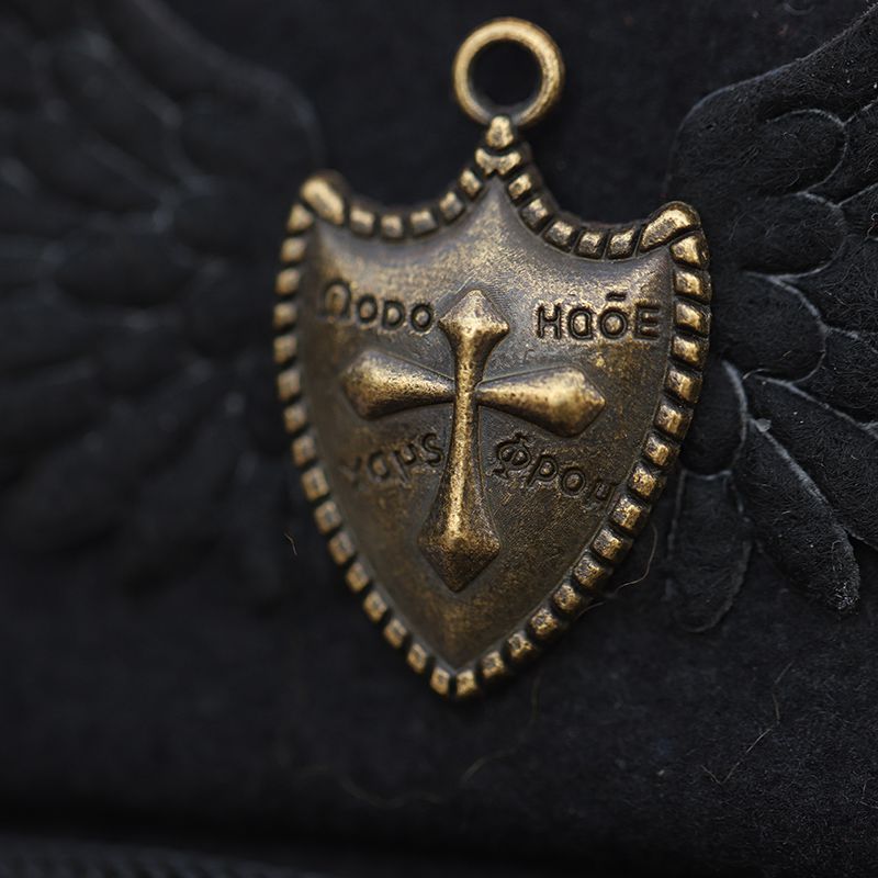 Chic Black Beret with Wing & Chain Accent