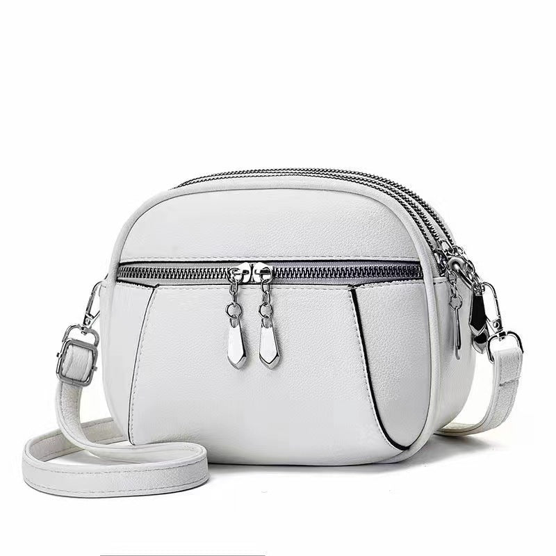 Stylish Solid Color Round Crossbody Bag for Women - Multi-Pocket Design