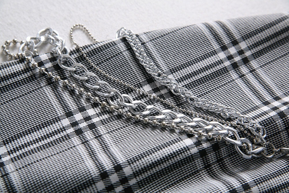Trendy Plaid Hip Hugging Mini Skirt with Stylish Chain Detail